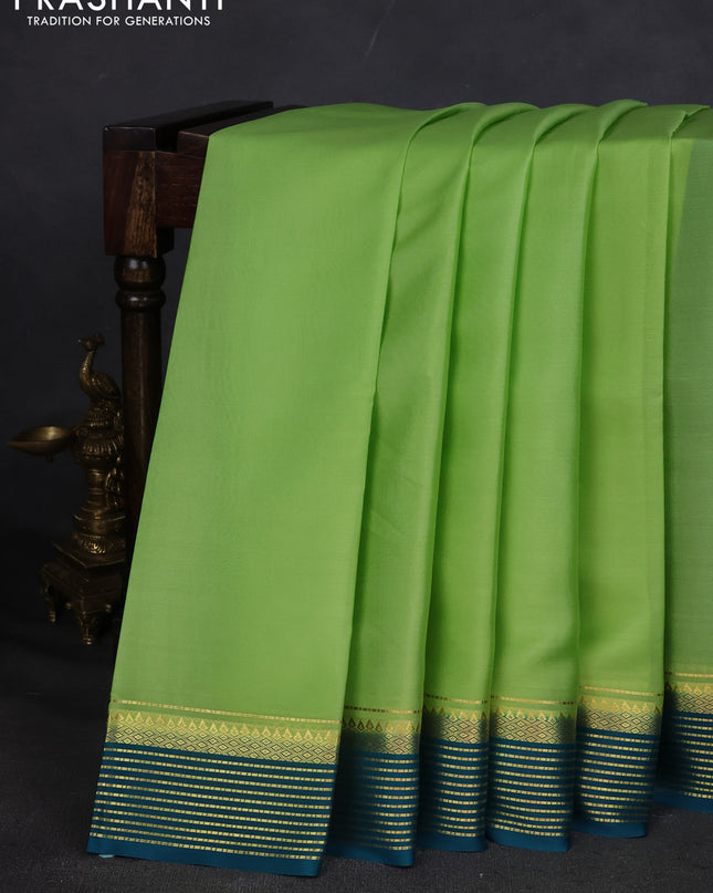 Pure mysore silk saree pista green and teal blue with plain body and zari woven border