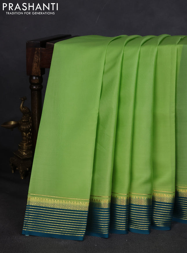 Pure mysore silk saree pista green and teal blue with plain body and zari woven border