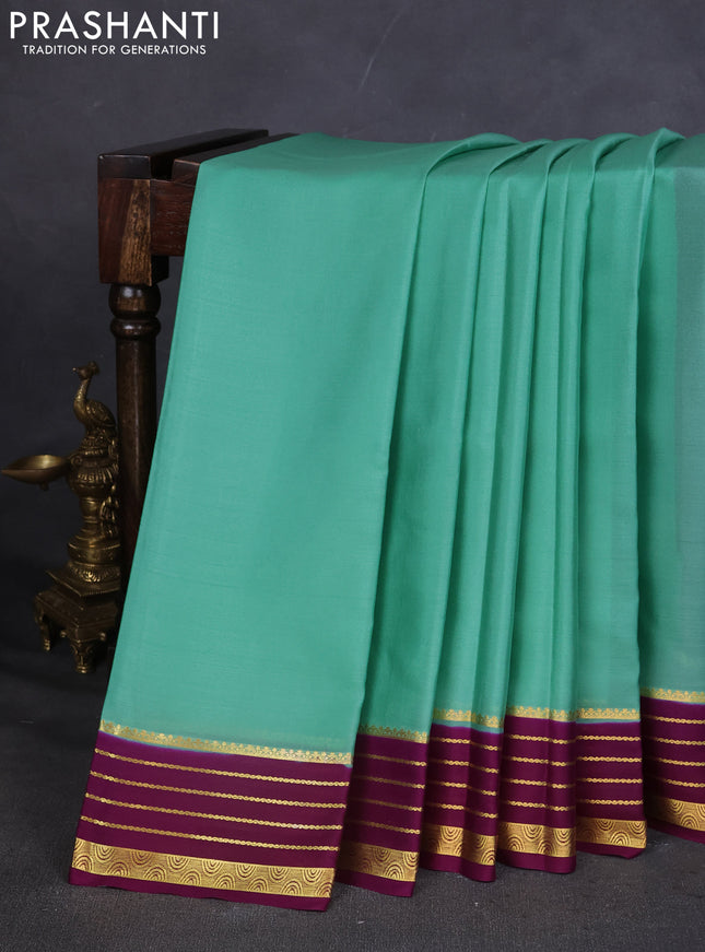 Pure mysore silk saree pastel green and purple with plain body and zari woven border