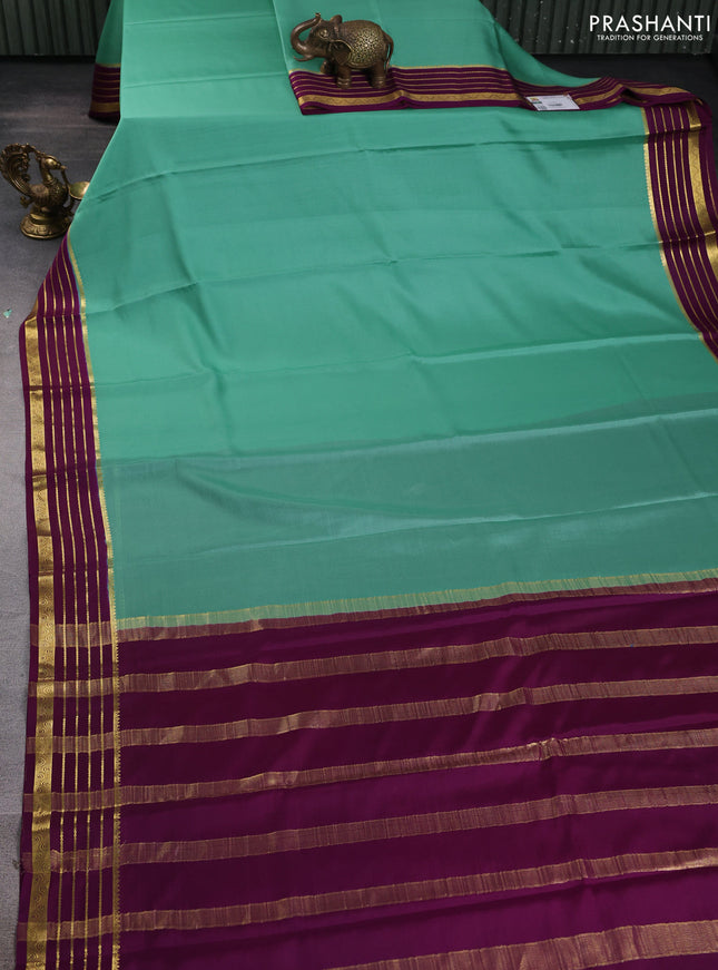 Pure mysore silk saree pastel green and purple with plain body and zari woven border