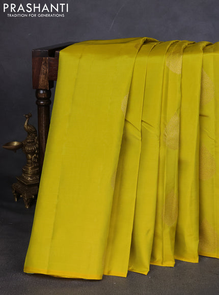Kanchipuram silk saree lime yellow and red with zari woven buttas in borderless style