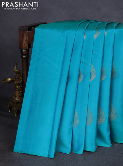 Kanchipuram silk saree teal blue and red with zari woven buttas in borderless style