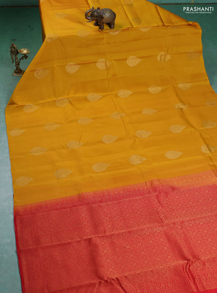 Kanchipuram silk saree mustard yellow and red with zari woven buttas in borderless style