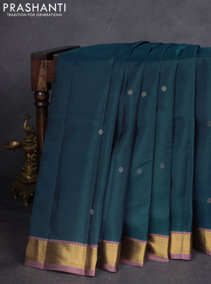 Kanchipuram silk saree peacock blue and rosy brown with zari woven buttas and zari woven border