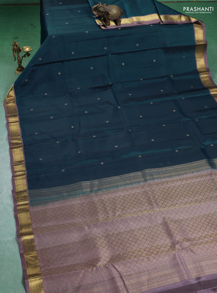 Kanchipuram silk saree peacock blue and rosy brown with zari woven buttas and zari woven border