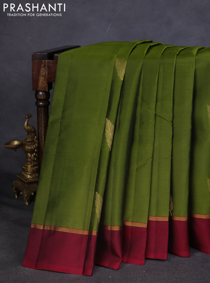 Kanchipuram silk saree mehendi green and maroon with zari woven buttas and zari woven simple border