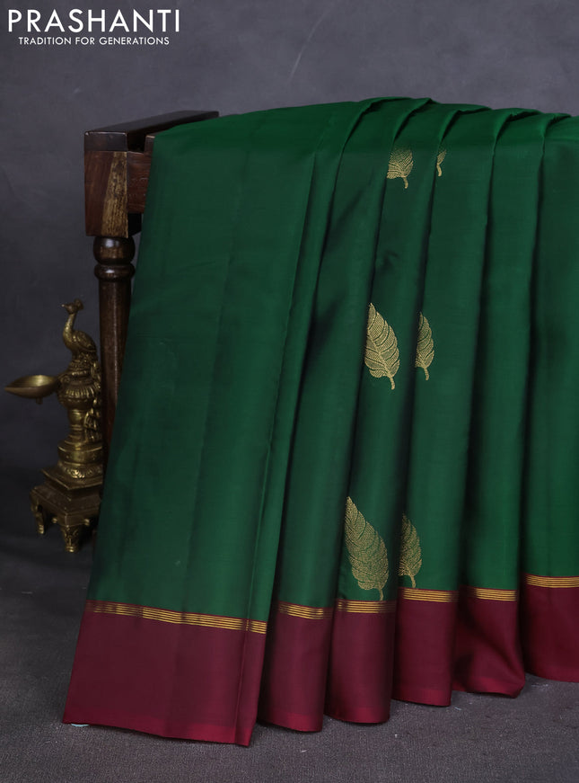 Kanchipuram silk saree green and maroon with zari woven buttas and zari woven simple border
