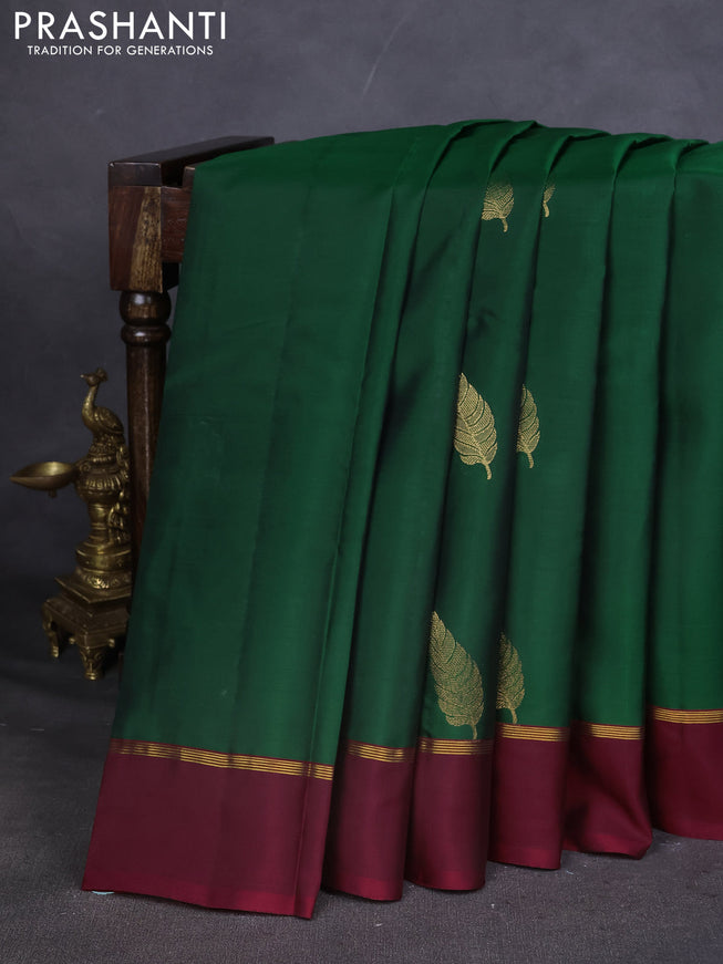 Kanchipuram silk saree green and maroon with zari woven buttas and zari woven simple border