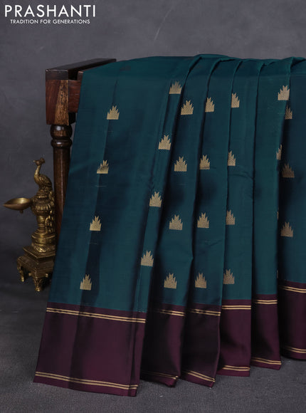 Kanchipuram silk saree peacock green and deep wine with temple zari woven buttas and rettapet zari woven border