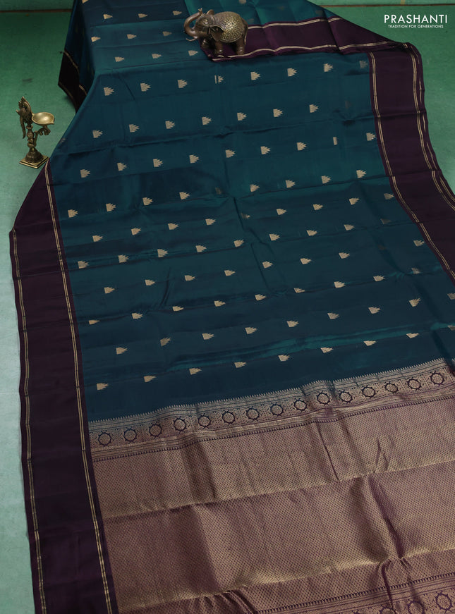 Kanchipuram silk saree peacock green and deep wine with temple zari woven buttas and rettapet zari woven border