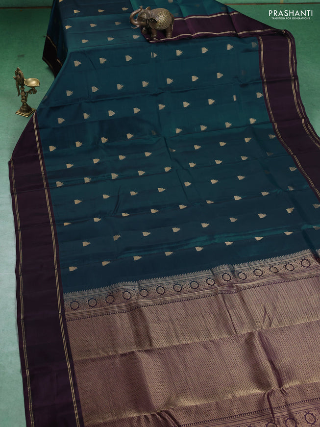 Kanchipuram silk saree peacock green and deep wine with temple zari woven buttas and rettapet zari woven border