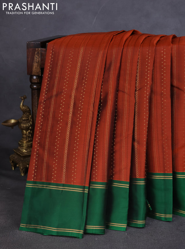 Kanchipuram silk saree orange and green with self emboss & zari weaves and rettapet zari woven border