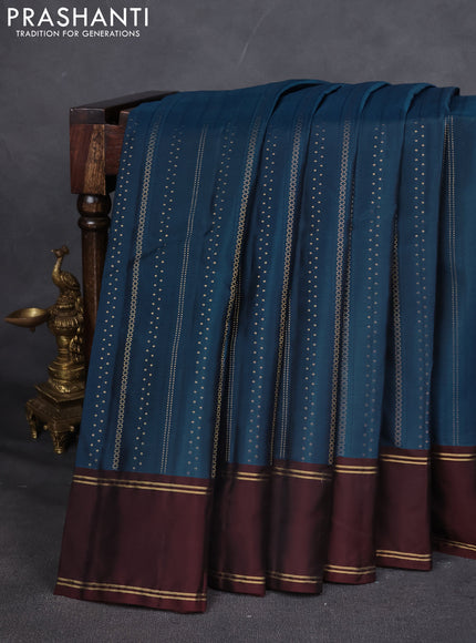 Kanchipuram silk saree peacock blue and deep maroon with self emboss & zari weaves and rettapet zari woven border
