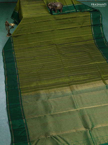 Kanchipuram silk saree mehendi green and green with self emboss & zari weaves and rettapet zari woven border