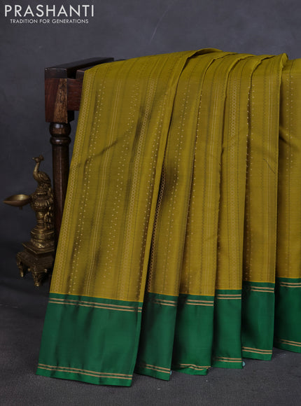 Kanchipuram silk saree mehendi green and green with allover zari weaves and rettapet zari woven border