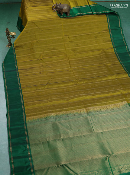 Kanchipuram silk saree mehendi green and green with allover zari weaves and rettapet zari woven border