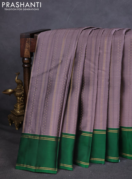Kanchipuram silk saree grey and green with allover zari weaves and rettapet zari woven border