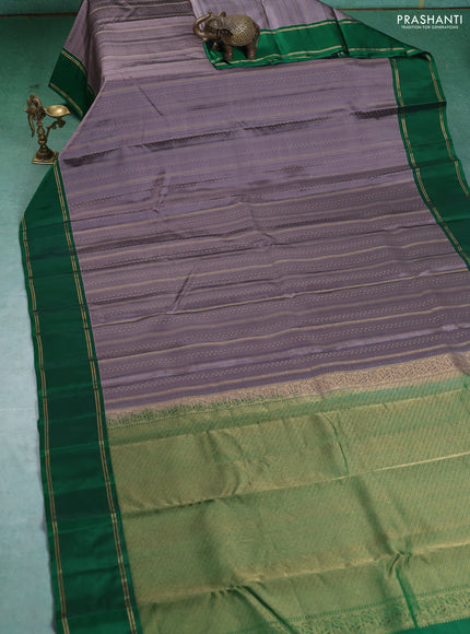 Kanchipuram silk saree grey and green with allover zari weaves and rettapet zari woven border