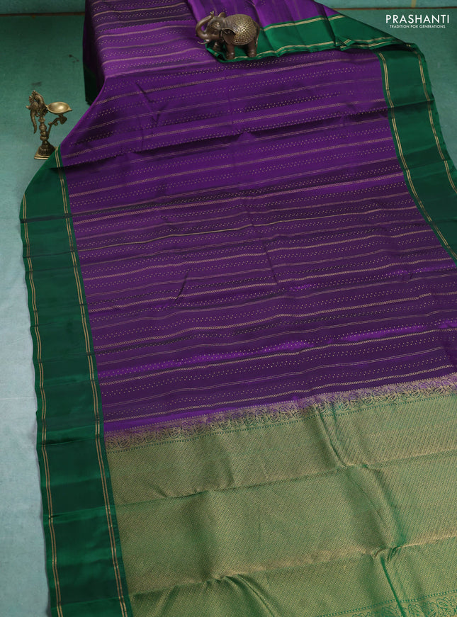 Kanchipuram silk saree violet and green with allover zari weaves and rettapet zari woven border