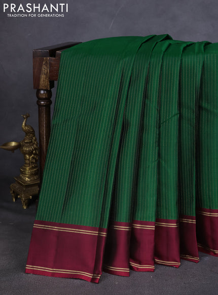 Kanchipuram silk saree green and maroon with allover zari weaves and rettapet zari woven border