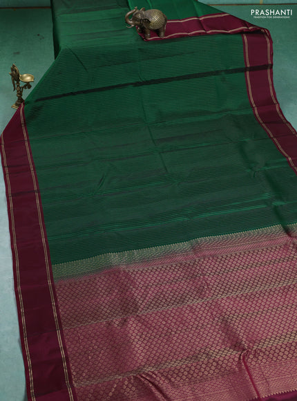 Kanchipuram silk saree green and maroon with allover zari weaves and rettapet zari woven border