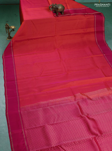 Kanchipuram silk saree dual shade of pinkish orange and pink with allover zari weaves and rettapet zari woven border