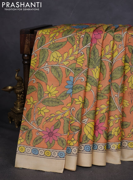 Pure tussar silk saree pale orange and beige with allover pen kalamkari prints and printed border