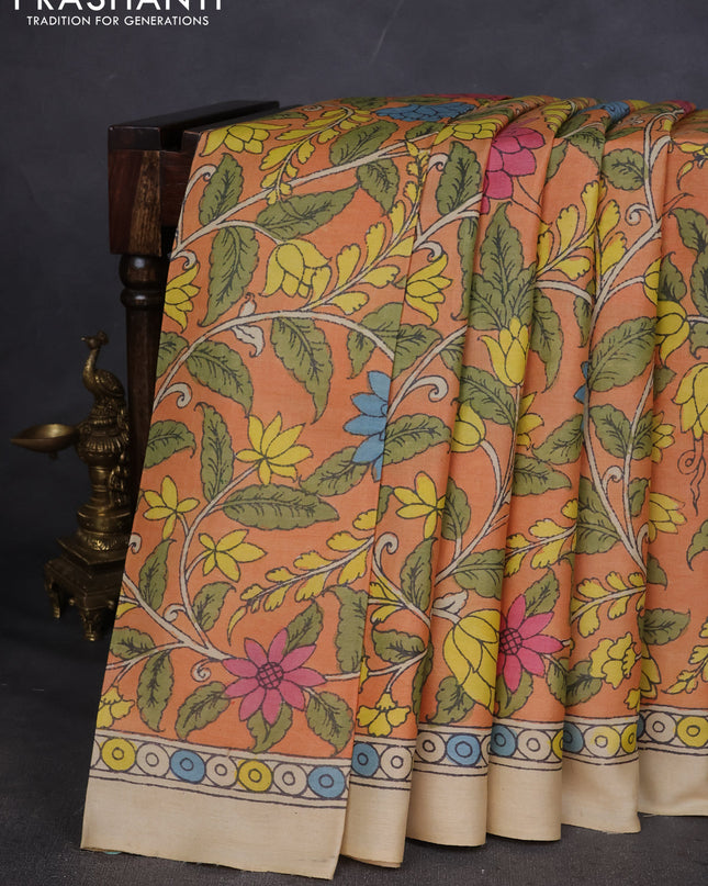 Pure tussar silk saree pale orange and beige with allover pen kalamkari prints and printed border