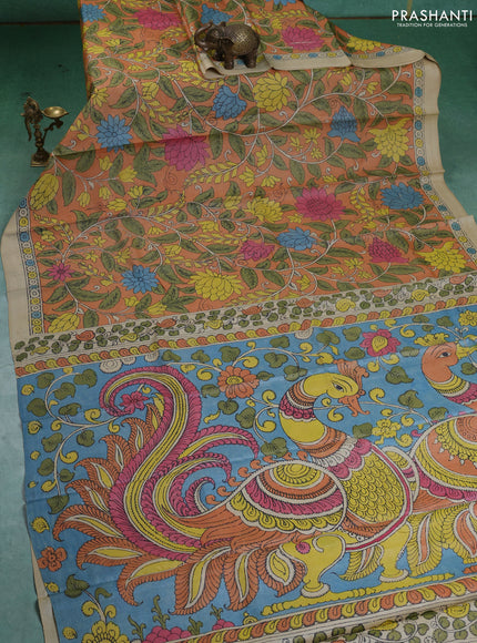 Pure tussar silk saree pale orange and beige with allover pen kalamkari prints and printed border