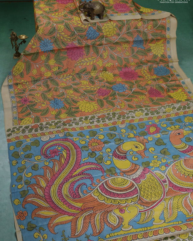 Pure tussar silk saree pale orange and beige with allover pen kalamkari prints and printed border
