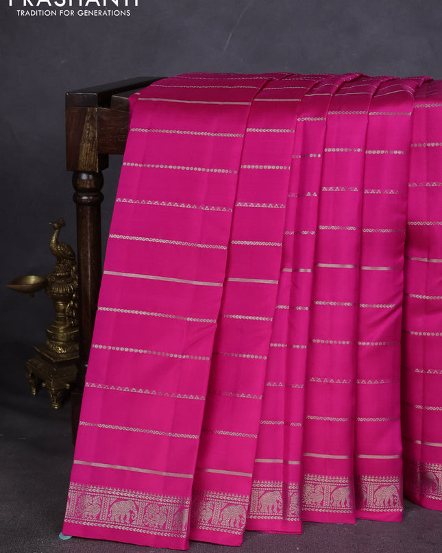 Pure Soft silk saree rani pink with allover silver zari stripes pattern and silver zari woven border