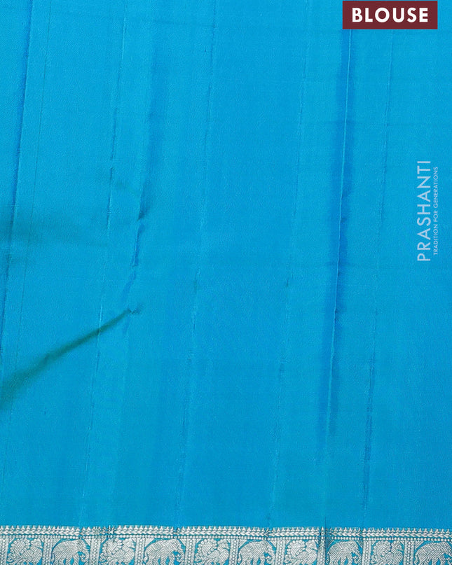 Pure Soft silk saree teal blue with allover silver zari stripes pattern and silver zari woven border