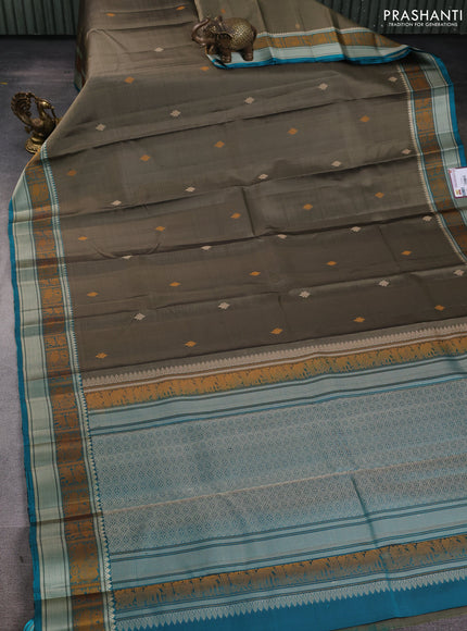 Pure Soft silk saree chikku shade and teal green with thread woven buttas and thread woven border