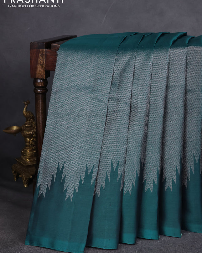 Pure Soft silk saree peacock green with allover silver zari brocade weaves and temple design border
