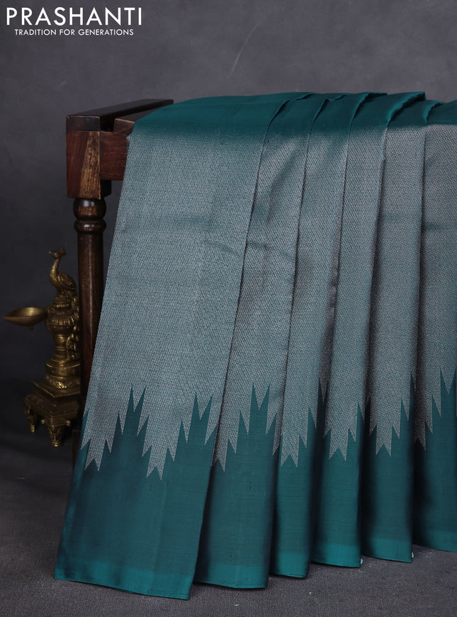 Pure Soft silk saree peacock green with allover silver zari brocade weaves and temple design border