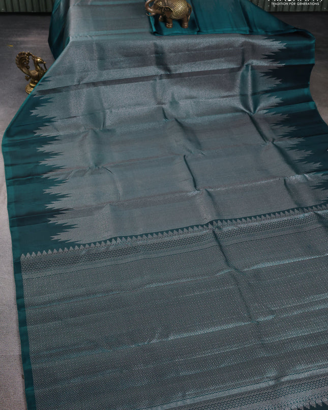 Pure Soft silk saree peacock green with allover silver zari brocade weaves and temple design border