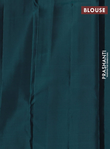 Pure Soft silk saree peacock green with allover silver zari brocade weaves and temple design border