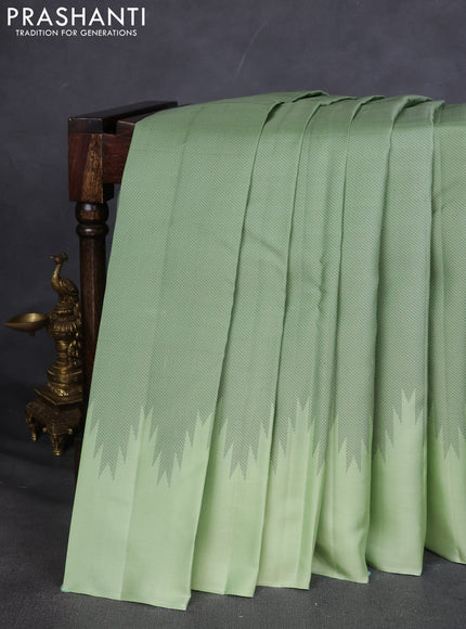 Pure Soft silk saree pista green with allover thread woven brocade weaves and temple design border