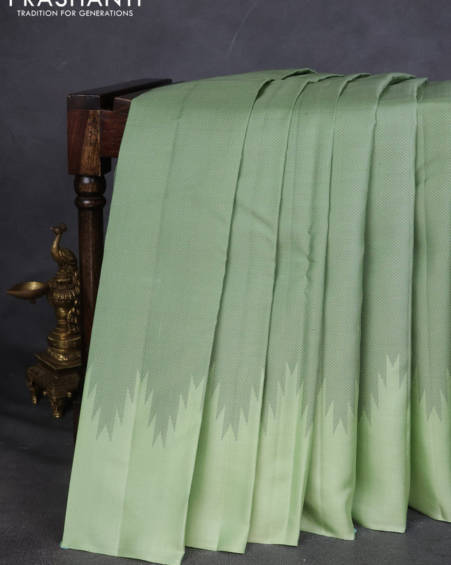 Pure Soft silk saree pista green with allover thread woven brocade weaves and temple design border