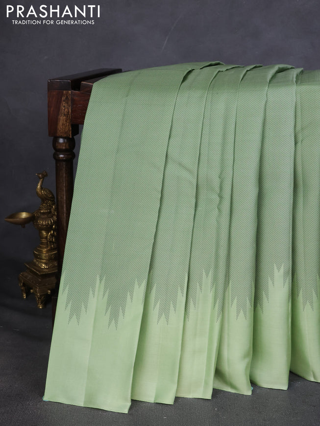 Pure Soft silk saree pista green with allover thread woven brocade weaves and temple design border