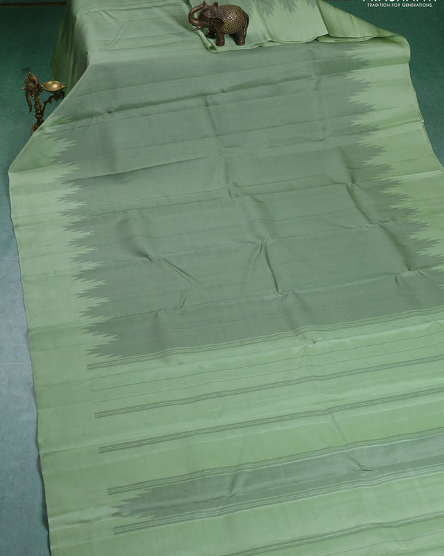 Pure Soft silk saree pista green with allover thread woven brocade weaves and temple design border