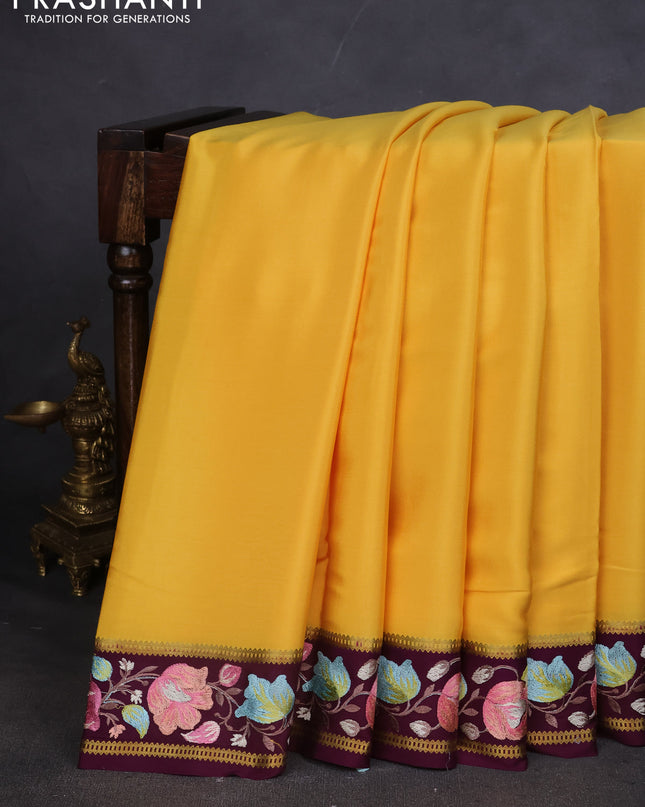 Pure mysore silk saree yellow and deep purple with plain body and embroided border