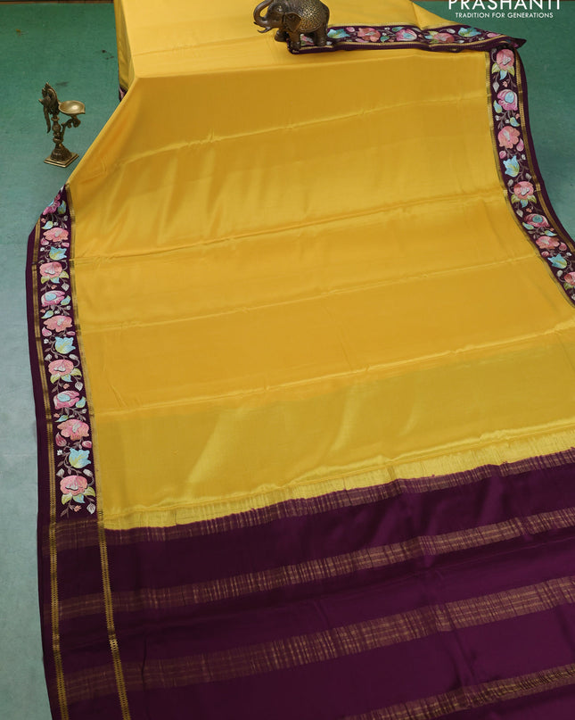 Pure mysore silk saree yellow and deep purple with plain body and embroided border
