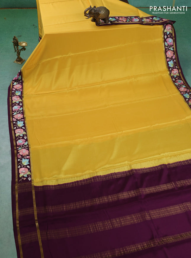 Pure mysore silk saree yellow and deep purple with plain body and embroided border