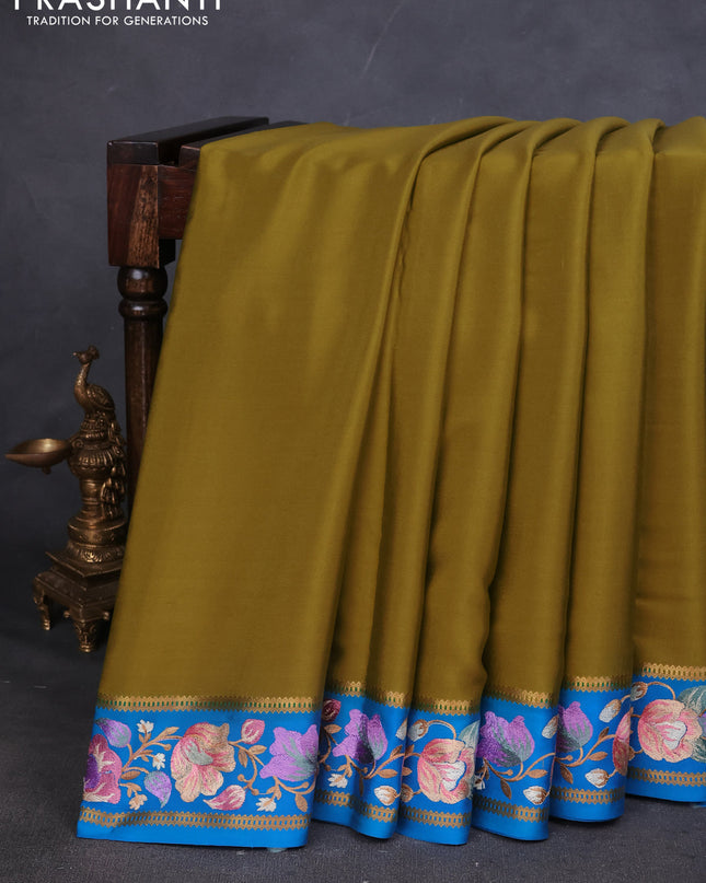 Pure mysore silk saree lime green and cs blue with plain body and embroided border
