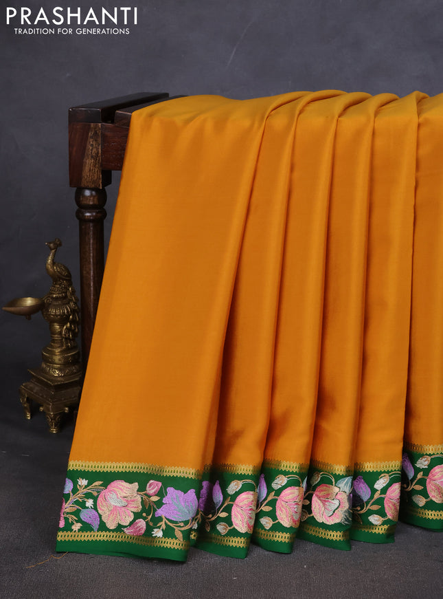 Pure mysore silk saree mustard yellow and green with plain body and embroided border