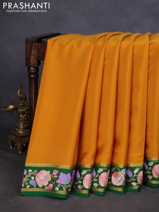 Pure mysore silk saree mustard yellow and green with plain body and embroided border