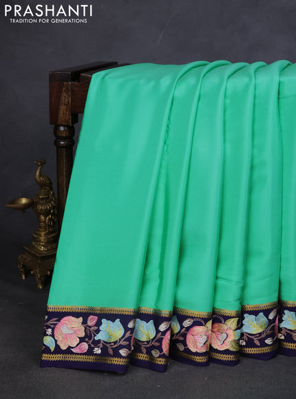Pure mysore silk saree teal green and navy blue with plain body and embroided border