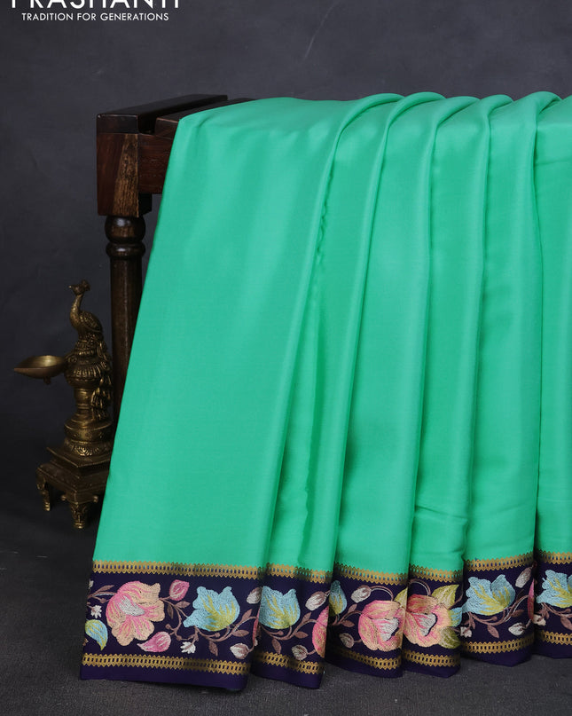 Pure mysore silk saree teal green and navy blue with plain body and embroided border