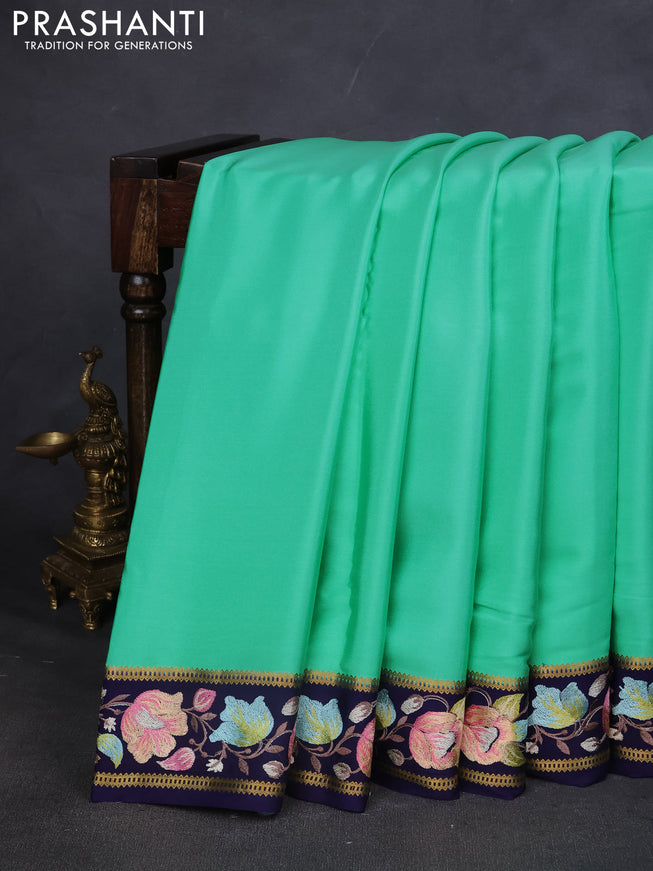 Pure mysore silk saree teal green and navy blue with plain body and embroided border